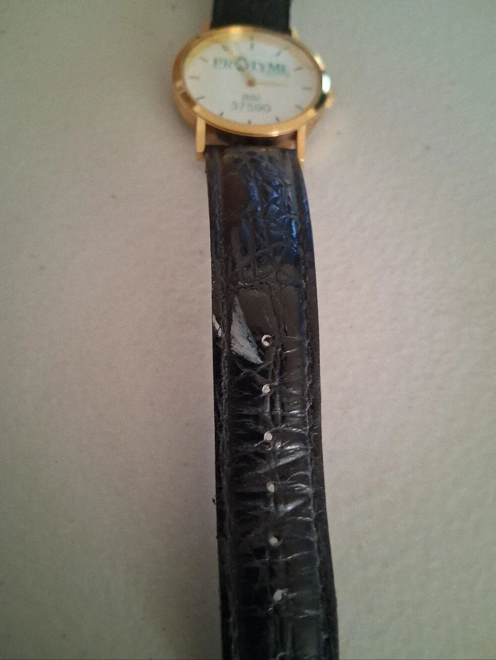 Pro Tyme Branded Gold-Tone Watch with Black Leather Strap